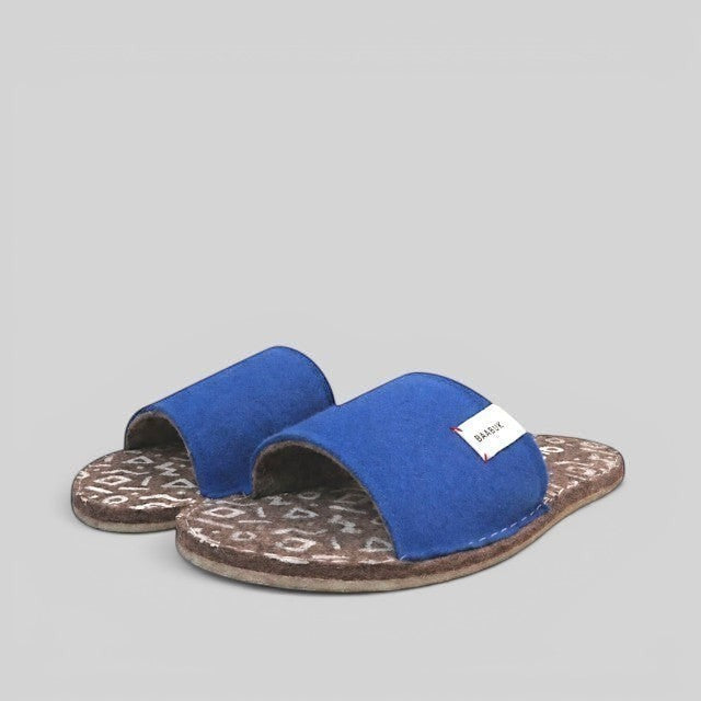 Baabuk Baabulette wool slide sandals in ultra marine blue with a patterned compressed wool footbed and rubber sole.