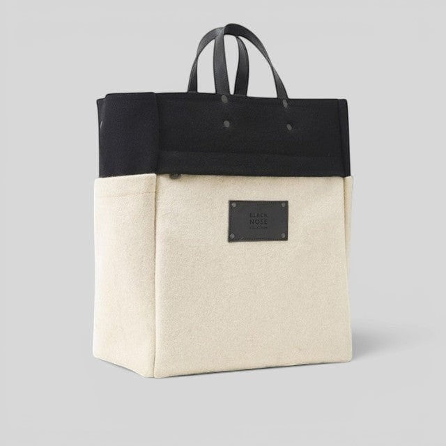 Baabuk BBB Bag in black and cream burel wool with leather handles and Blacknose Collection label.