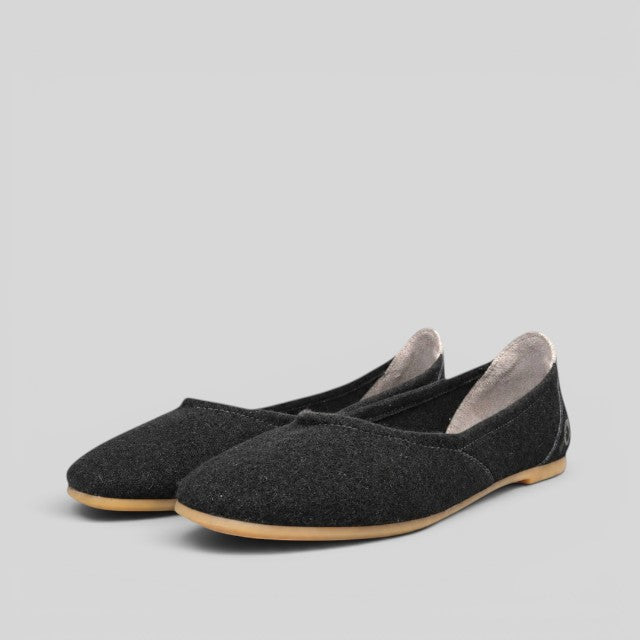 Baabuk black wool ballerina flats with a durable rubber sole and comfortable sheep wool upper.