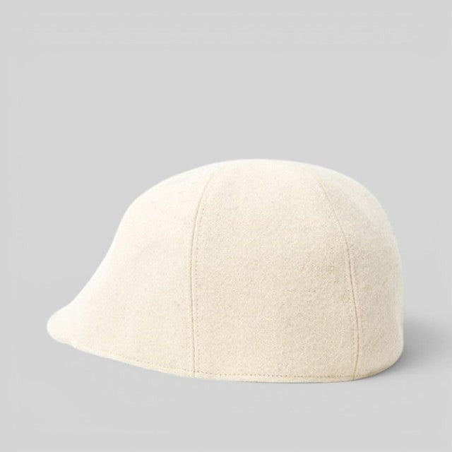 Baabuk Blacknose wool beret in off-white, inspired by traditional Portuguese shepherd hats.