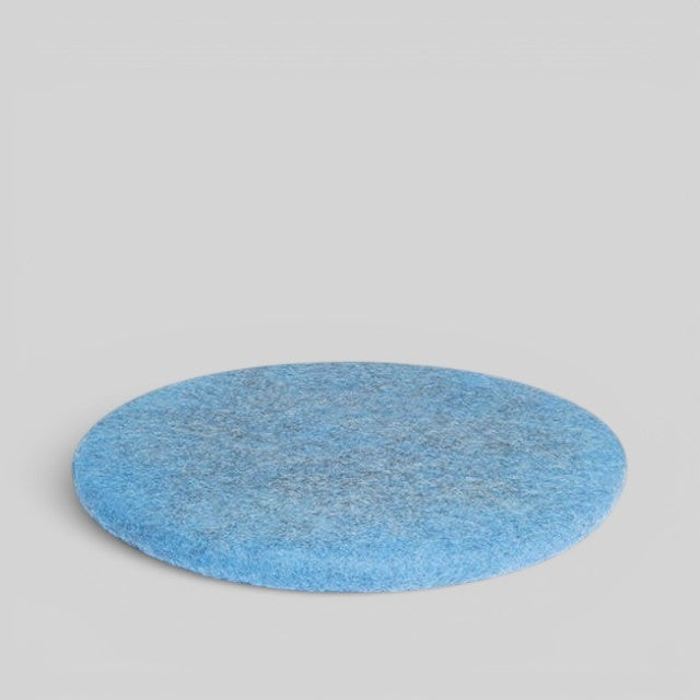 Baabuk handmade blue circular wool sitting mat made from natural New Zealand wool