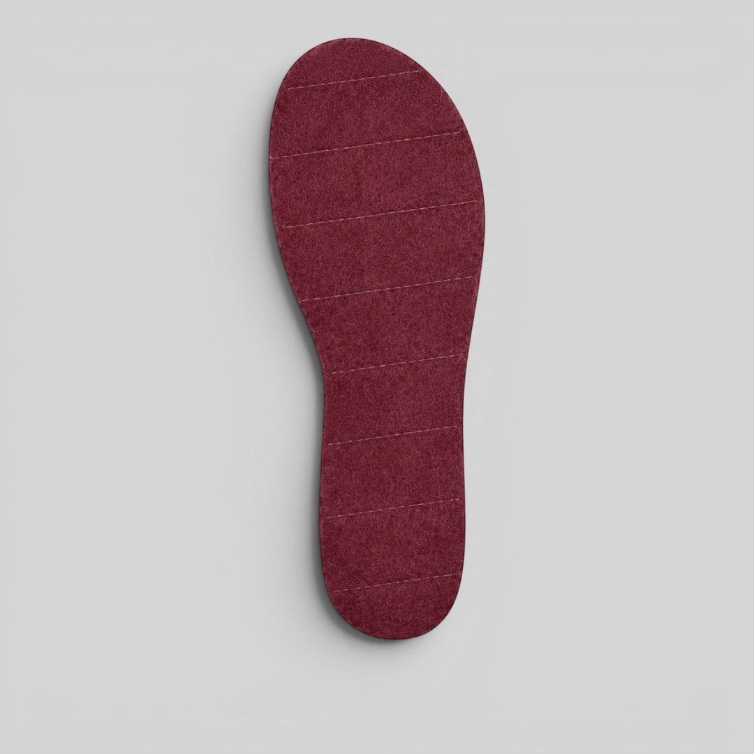 Baabuk bordeaux felt slipper insoles with horizontal stitching, handcrafted in Nepal for extra comfort.