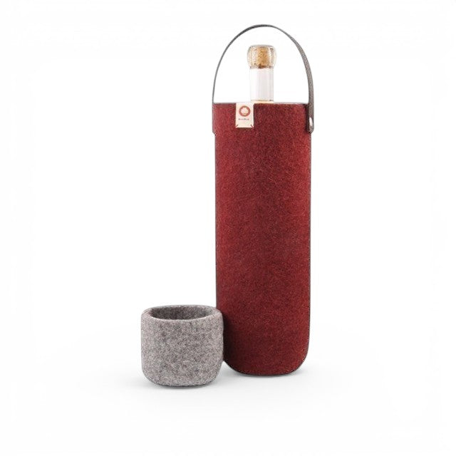 Baabuk Bordeaux wool wine cooler with leather strap and matching grey felt base for insulated bottle storage.