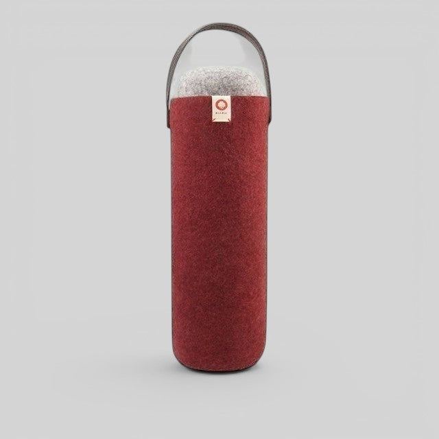Baabuk Bordeaux wool wine cooler with a leather strap, designed to keep wine chilled without ice.