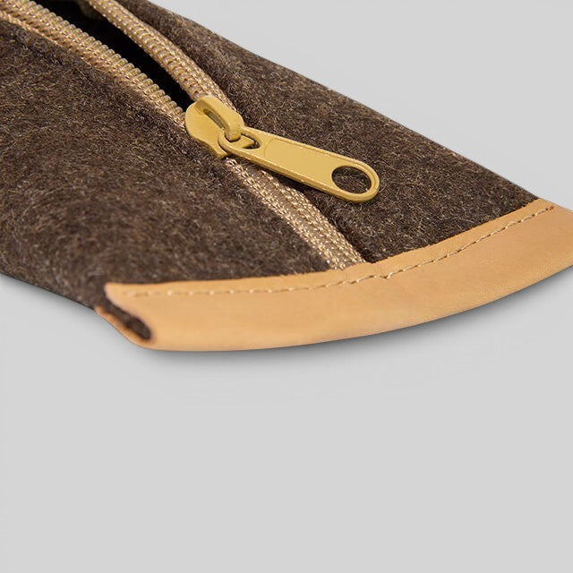 Baabuk brown wool pencil case with genuine leather trim and a gold zipper closure