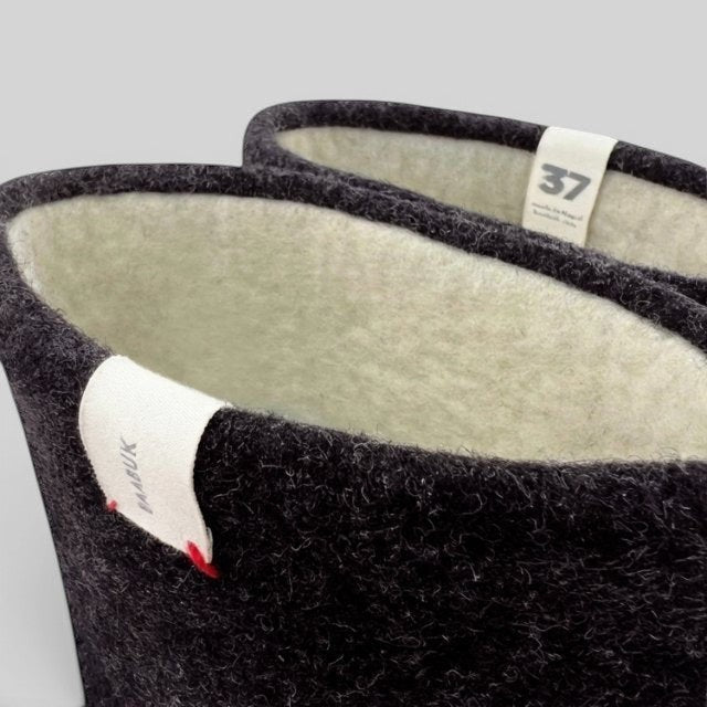 Baabuk Dani dark grey wool boots with cream interior lining and size 37 tag detail
