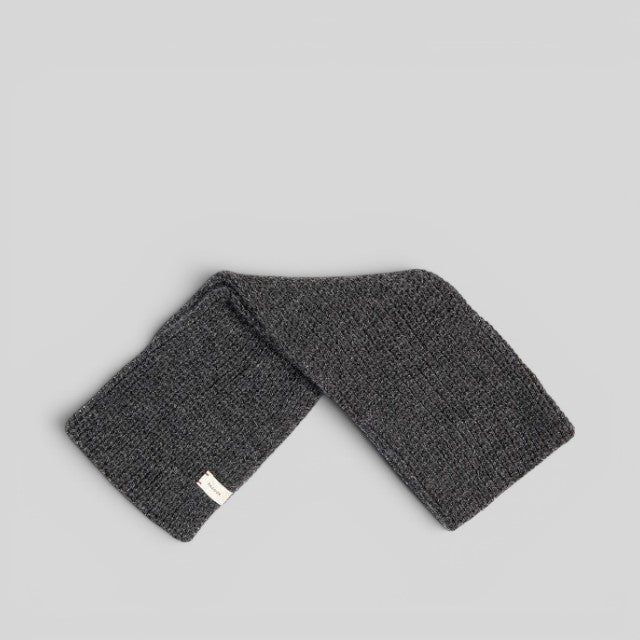 Baabuk dark grey infinity scarf made from soft baby alpaca wool with a textured knit finish