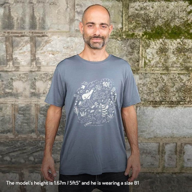 Baabuk dark grey 100% merino wool t-shirt with a white anniversary illustration by Ana Seixas Santos on a man.