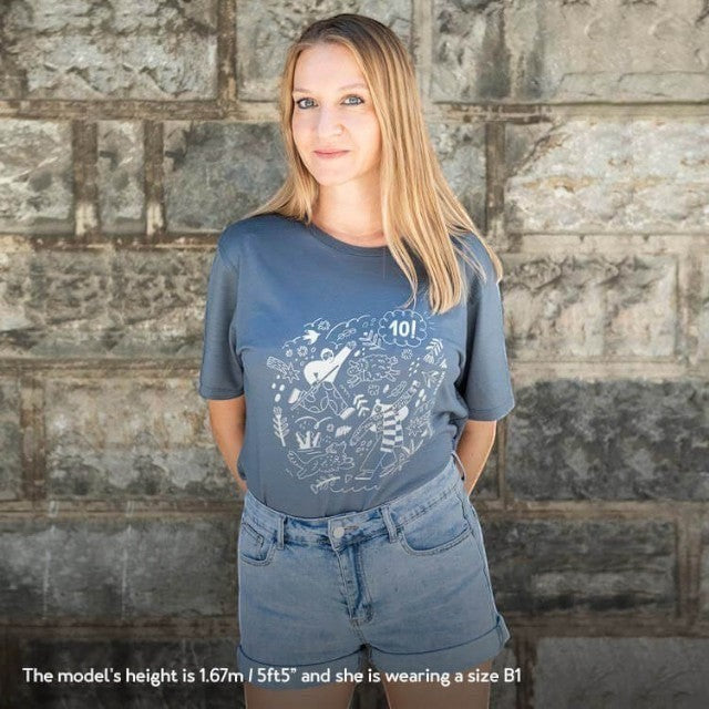 Baabuk dark grey merino wool T-shirt with a white graphic illustration by Ana Seixas Santos, worn by a blonde model.