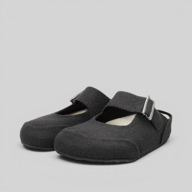 Baabuk grey wool Mary Jane sandals with an adjustable buckle strap and cork insole on a light grey background.