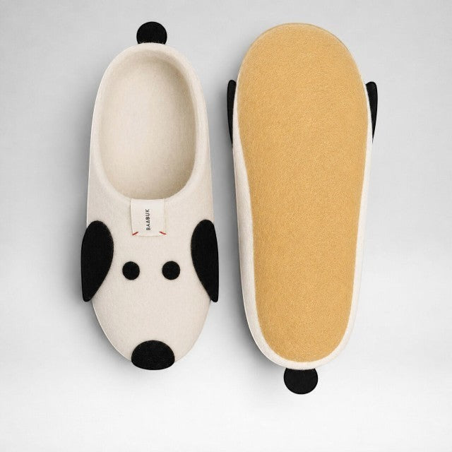 Baabuk Kanga Woof slippers in off-white wool with black dog-inspired felt details and a natural latex sole.