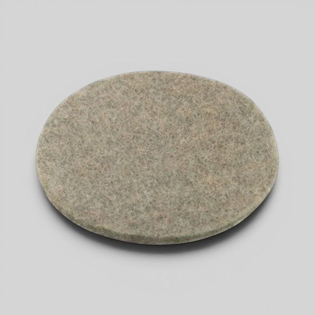 Baabuk khaki round felt coaster made from 100% natural wool for furniture protection
