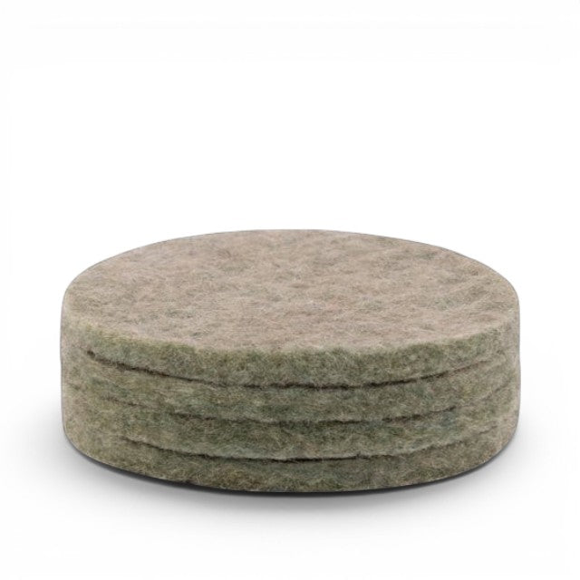 Baabuk set of four round khaki felt coasters made from 100% natural wool for furniture protection.