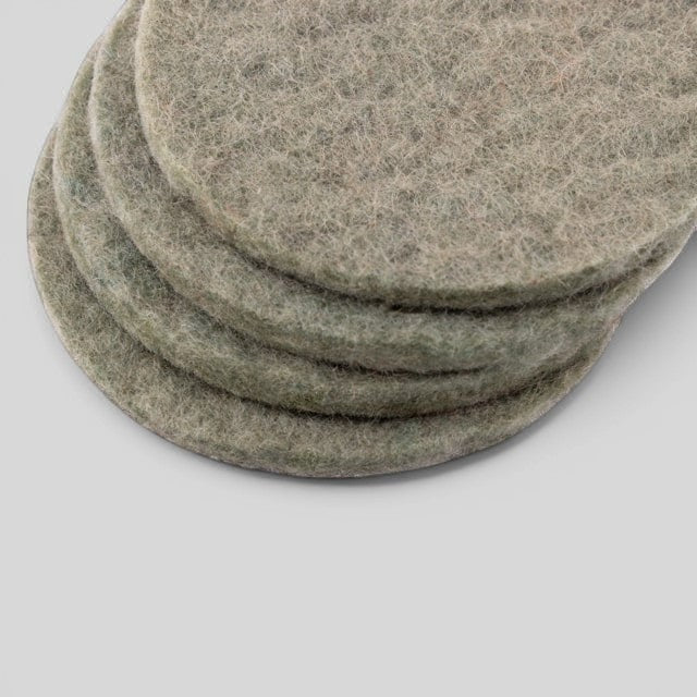 Baabuk set of four round khaki felt coasters made from sustainable New Zealand wool