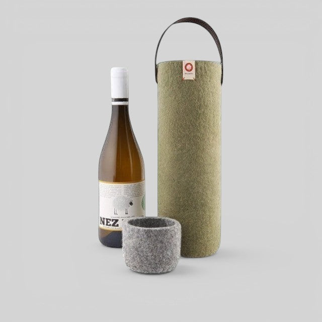 Baabuk khaki green wool wine cooler with leather strap and matching grey wool coaster next to a wine bottle