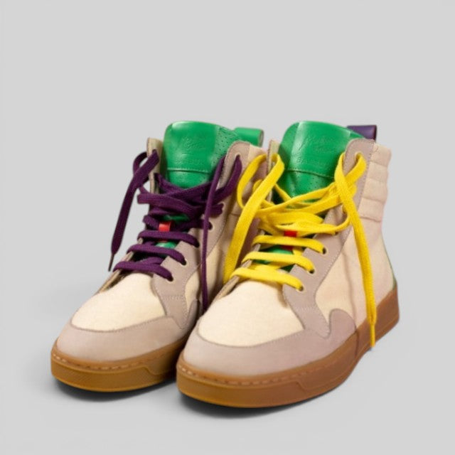 Baabuk Lakeside Wooler high-top sneakers featuring cream wool, green tongues, and mismatched purple and yellow laces.
