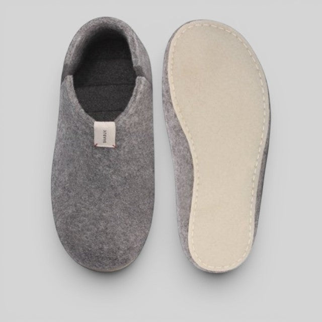 Baabuk Lisa light grey wool slippers with natural crepe rubber soles, handmade in Nepal.