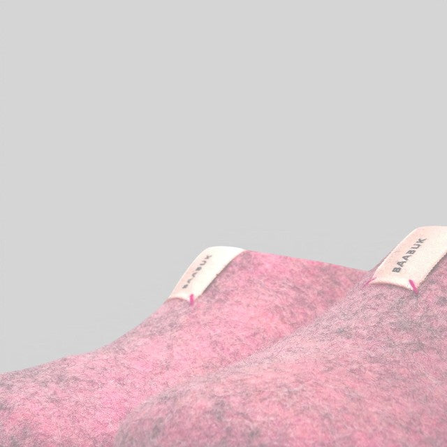 Baabuk Mel pink wool slippers with branded fabric tabs, handmade from natural New Zealand wool.