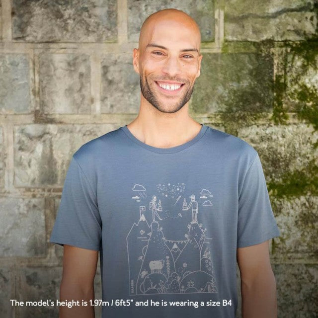 Model wearing a dark grey Baabuk merino wool T-shirt with a white Swiss-themed graphic illustration by Jamie Aspinal.