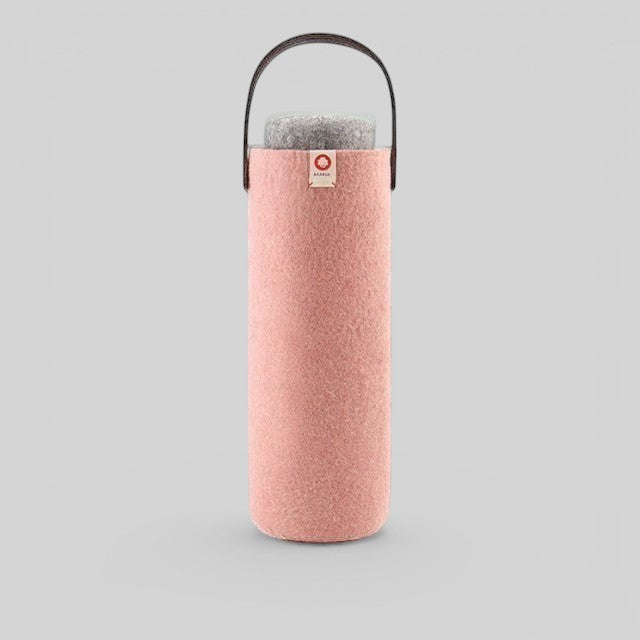 Baabuk pink wool wine cooler with a brown leather handle, designed for eco-friendly bottle insulation.