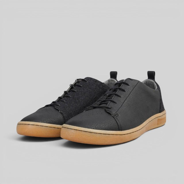 Baabuk Shunya Wooler black sustainable sneakers featuring wool and plant-based leather with a natural rubber sole.