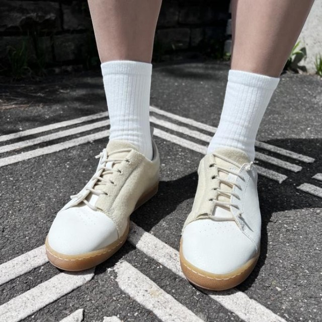 Baabuk Shunya Wooler white sneakers made from Burel wool and plant-based leather worn with white ribbed socks