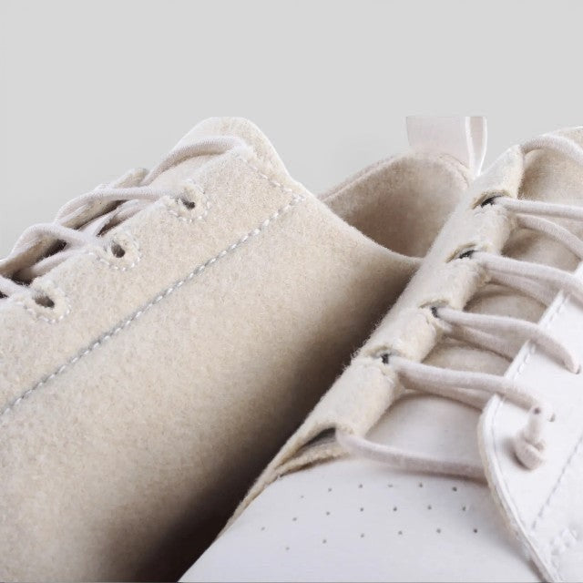 Baabuk Shunya Wooler white sneakers featuring Burel wool upper and plant-based leather-like material detail