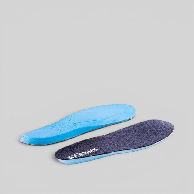 Baabuk SoftWalk sneaker insoles featuring a blue shock-absorbing base and a dark grey top layer with logo branding.