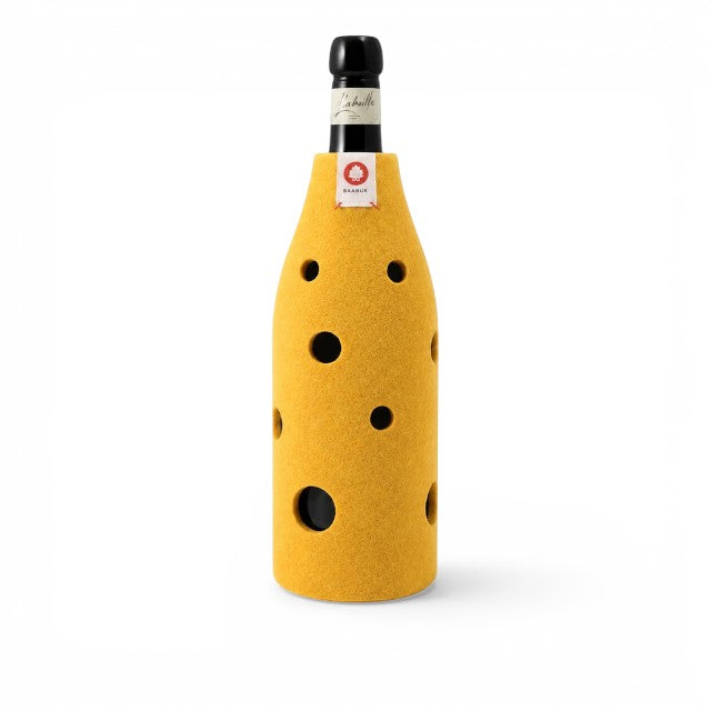 Baabuk yellow wool bottle cover with Swiss cheese hole design, providing natural insulation for a wine bottle.