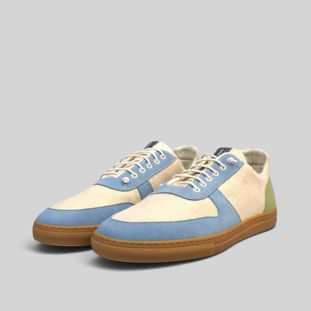 Baabuk Urban Wooler Wonderland sneakers in cream wool with blue nubuck accents and a gum rubber sole.