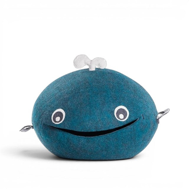 Baabuk Whalebuk blue felted wool whale storage basket with hand-stitched features and a white spout.