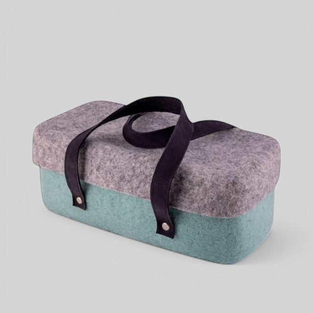 Baabuk light blue and grey wool beer cooler with black leather straps, perfect for picnics and BBQs.