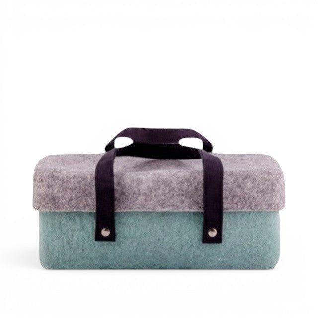 Baabuk light blue and grey wool beer cooler with dark straps and silver rivets. Handmade in Nepal.