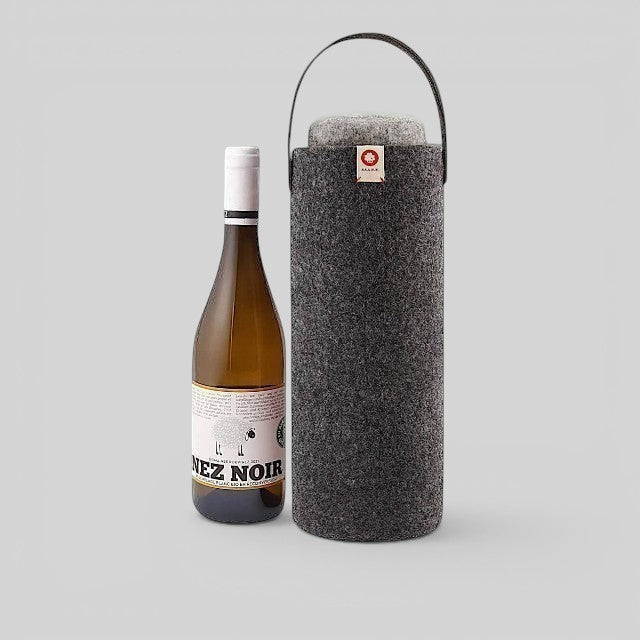 Baabuk dark grey wool wine cooler with a leather strap, keeping a wine bottle chilled for picnics or home use.