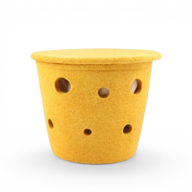 Baabuk small yellow felted wool basket with Swiss cheese hole design and lid, handmade from New Zealand wool.