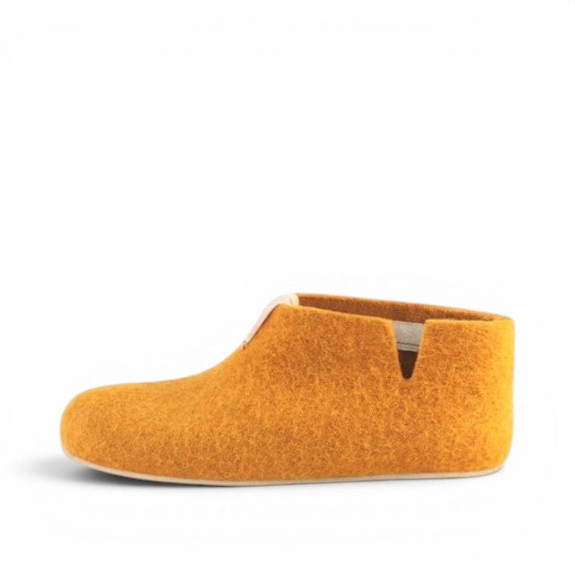Baabuk Yves Kids honey yellow wool slippers with natural crepe rubber soles, handmade in Nepal.
