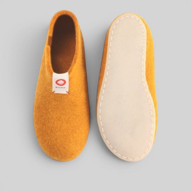 Baabuk Yves Kids honey yellow wool slippers with natural crepe rubber soles, handmade in Nepal.